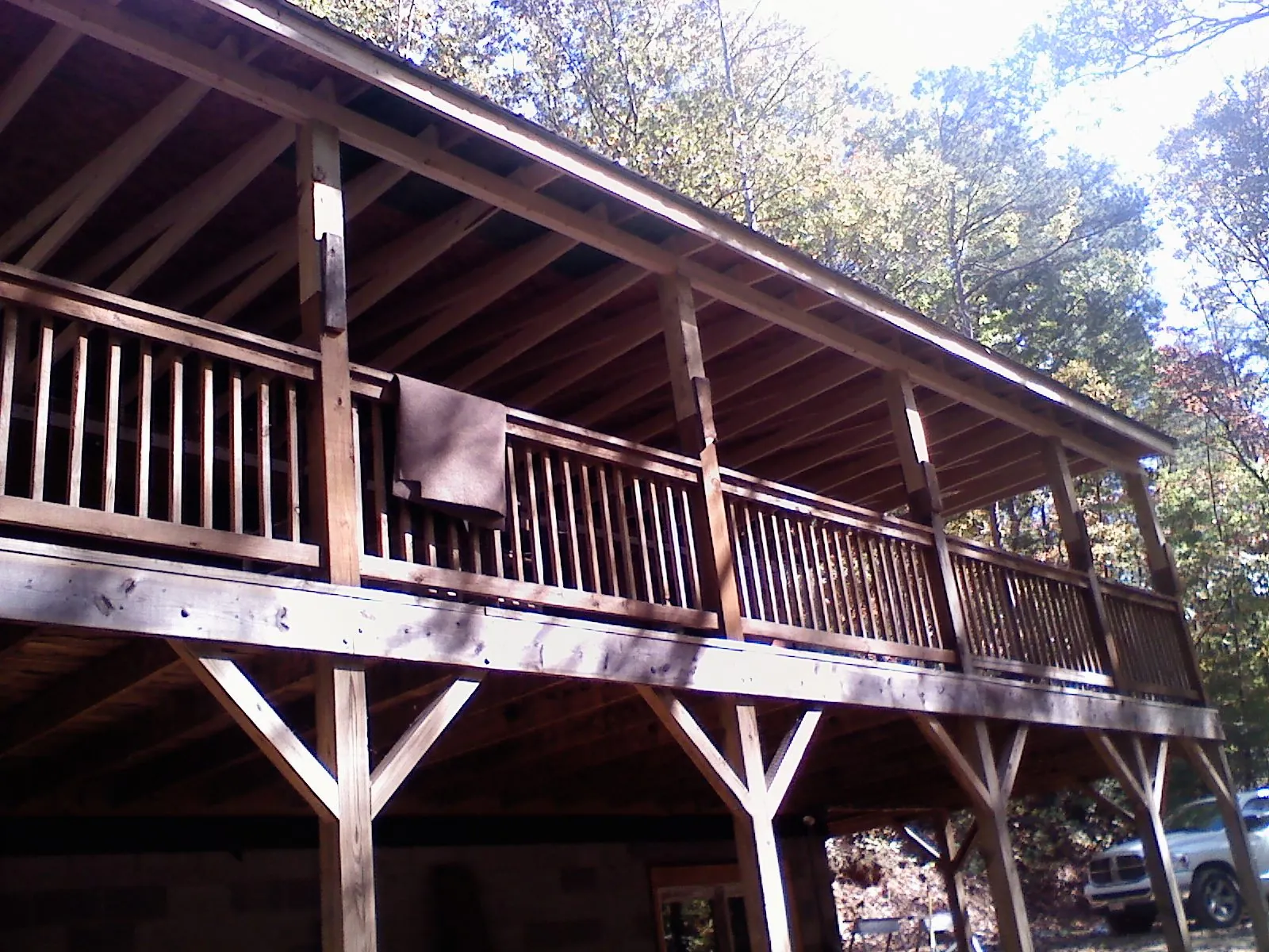 Timber framing under a new elevated porch and deck — Roof Leak Repair in Gardiner by Roofing Brothers